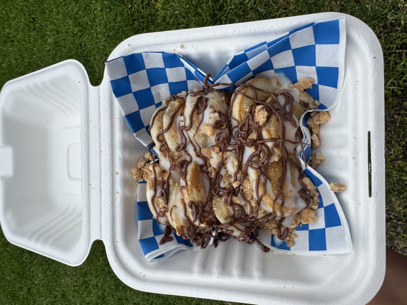Aerial view of a mini-pancake stack with drizzle